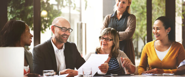 office people talking about project